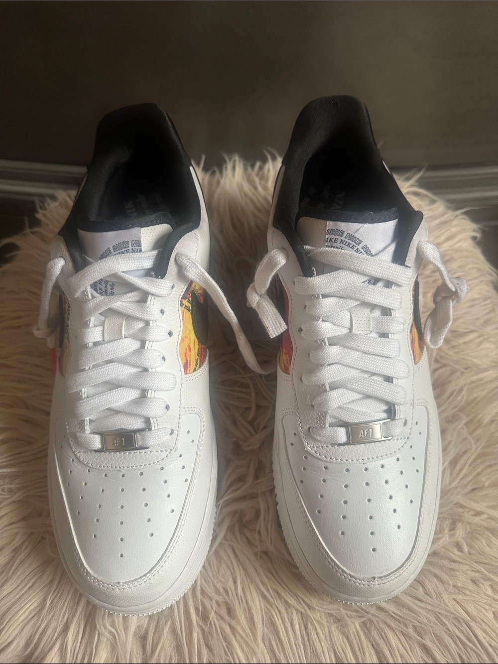 Nike Men’s White Leather Sneakers with Multicolor Swoosh Accent